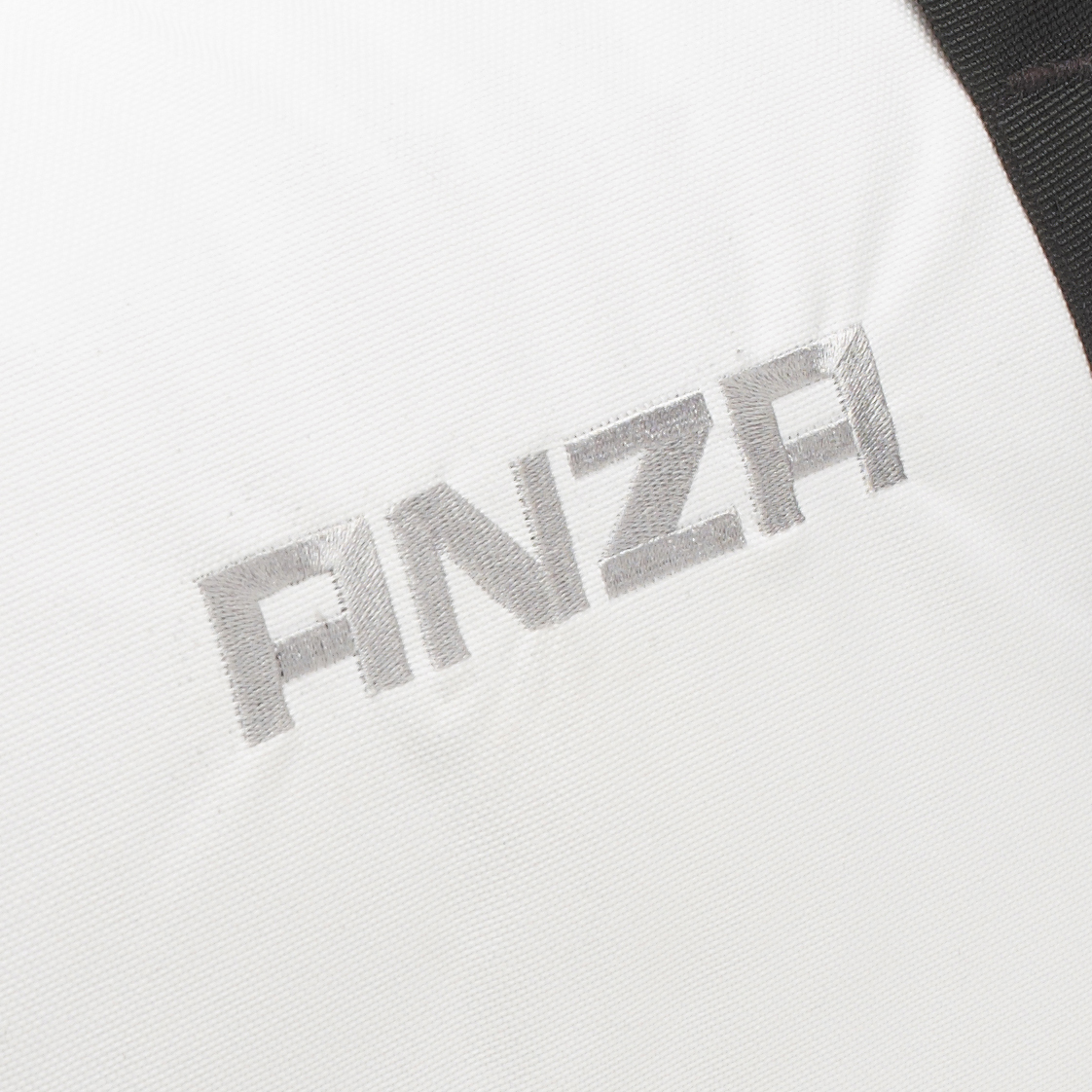 Anza logo på taske