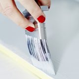 Skråtstillet sat på spidsen